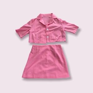 Solid lapel neck blazer with skirt.